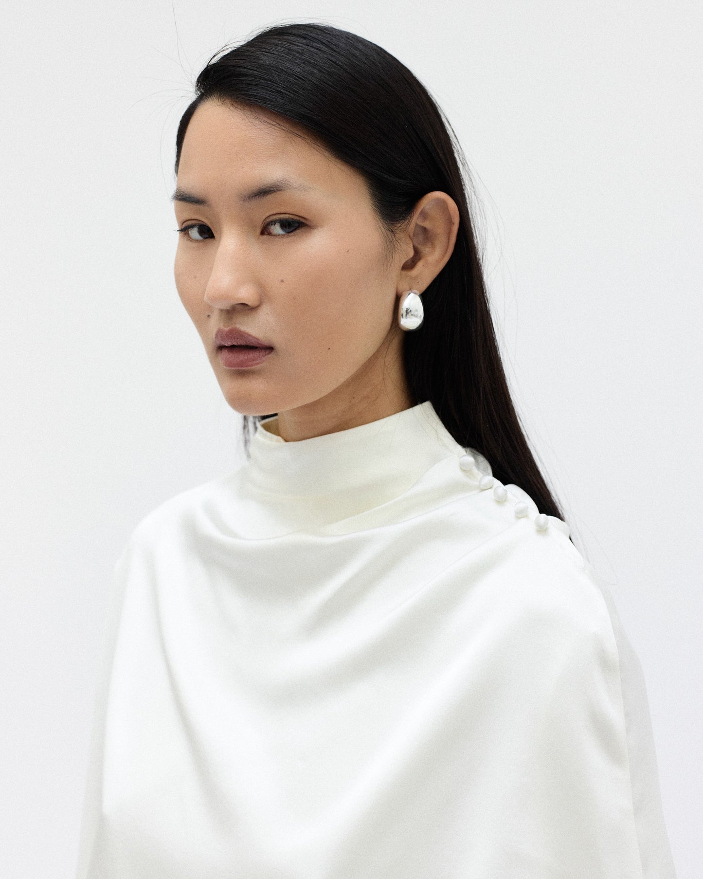 THE ISIS CAPE BLOUSE