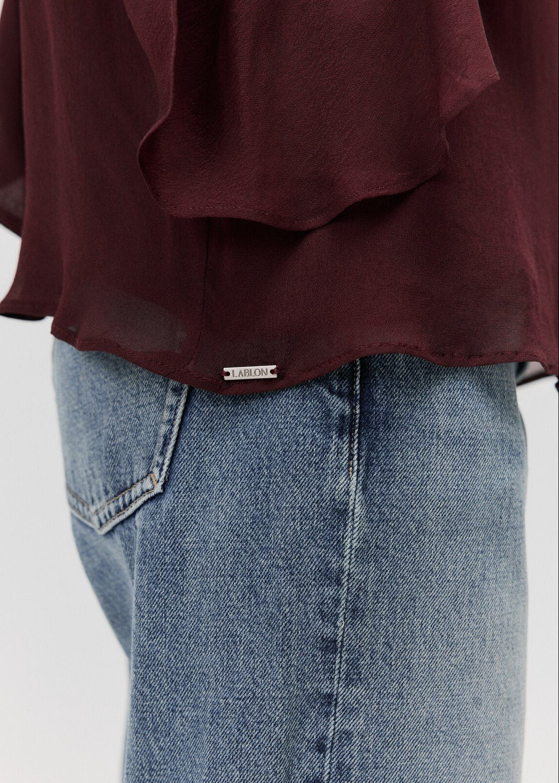 THE SOLAR CAPE BLOUSE