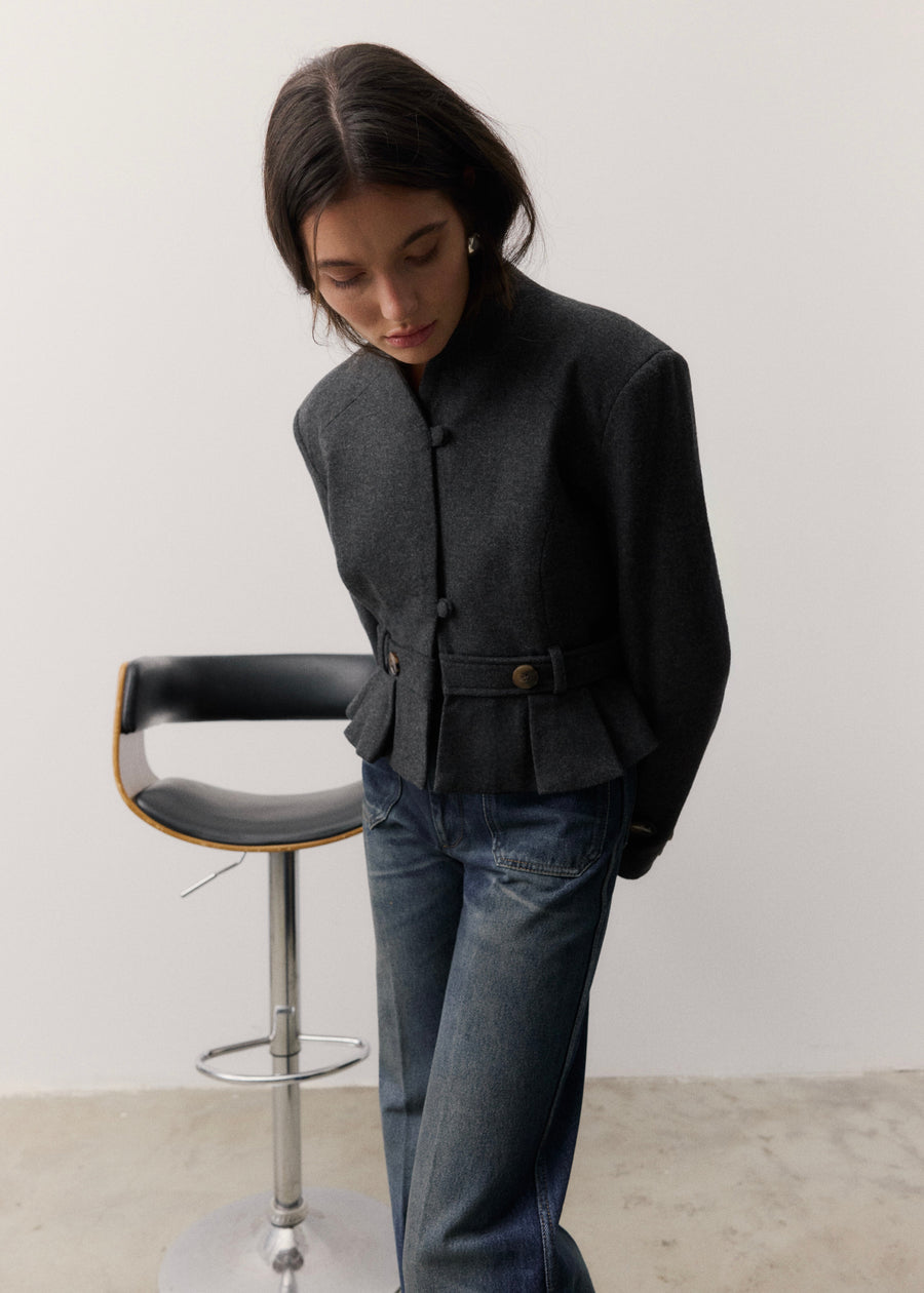 The Bruma Mandarin Collar Blazer in Grey Melange, styled with jeans